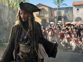 In this image released by Disney, Johnny Depp portrays Jack Sparrow in a scene from "Pirates of the Caribbean: Dead Men Tell No Tales." (Peter Mountain/Disney via AP)
