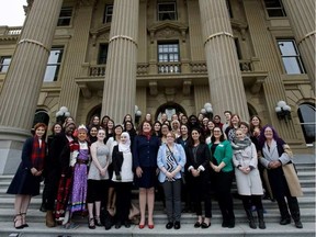 Minister of Seniors and Housing Lori Sigurdson, front centre, with Alberta's Daughters of the Vote delegates before they head to Ottawa for International Women's Day, on the steps of the Alberta Legislature, in Edmonton Friday Feb. 17, 2017. Daughters of the Vote is an organization dedicated to getting more women elected in all levels of government (David Bloom | Postmedia Network).