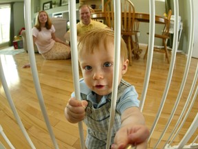 Safety gates can help keep children away from stairs or rooms that have hazards in them. Look for safety gates that children cannot dislodge easily, but that adults can open and close without difficulty. (Postmedia News file photo)