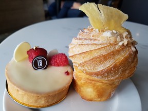 La Boule’s white chocolate raspberry tart (left) and a pineapple “cruffin” (right)