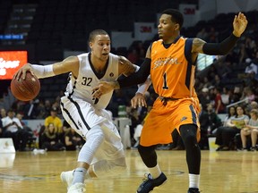 London Lightning guard Joel Friesen battles with Island Storm defender Jahii Carson during the first half of a National Basketball League of Canada game at the Budweiser Gardens in London on Tuesday April 25, 2017. (Free Press file photo)