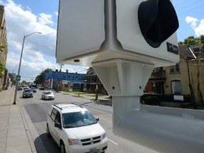 Red-light cameras face the intersection of Adelaide Street and Queens Avenue in London Ontario on Tuesday September 5, 2017. (MORRIS LAMONT, The London Free Press)