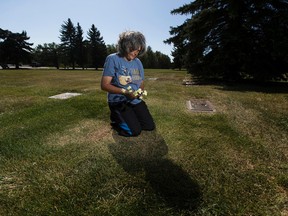 Karen Vallette, mother of slain six year old Corinne (Punky) Gustavson, will have to go to Castor tomorrow to commemorate the 25-year-anniversary of her daughter's death after her ex-husband had the body moved in late 2015. She is shown here on Tuesday September 5, 2017 in Edmonton at the gravesite where her daughter was originally buried.  Greg Southam / Postmedia