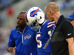 In this Aug. 26, 2017, file photo, Buffalo Bills quarterback Tyrod Taylor is assisted off the field after being sacked by Baltimore Ravens linebacker Matt Judon in the first half of a preseason NFL football game, in Baltimore. (AP Photo/Gail Burton, File)