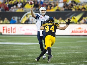 Argonauts quarterback Ricky Ray was only sacked once by Hamilton, but he was manhandled too many times and took some big hits. (The Canadian Press)