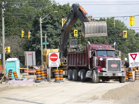 Water main, sidewalk and other work on Byron Baseline Road is slated to wrap up in November, the city says. (DEREK RUTTAN, The London Free Press)