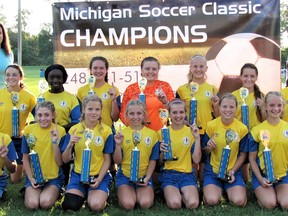 The Sarnia U13 Spirit won the U15 Girls Gold Division at the Michigan Soccer Classic in Rochester Hills, Mich., on Sunday, Sept. 3, 2017. Team members are, front row, left: Arianna Satram, Madison Tuer, Abby Balan, Emily Kzyonsek, Paige Vidler, Hannah Balan and Savanah VanHooft. Back row: manager Susie Sioutis, Grace Elliott, Koko Okutinyang, Ali McLellan, Cassidy VanPraet, Ainsley Mackenzie, Makayla Rapaich, Sarah Gardner and coach Kevin Simmonds. (Contributed Photo)