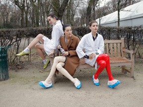 In this Jan.26 2015 file photo, models take a rest backstage after the Christian Dior's Spring-Summer 2015 Haute Couture fashion collection presented in Paris. Two of France's biggest luxury conglomerates LVMH and Kering have joined forces to establish a charter to protect the wellbeing of their fashion models and to ban size zero. (AP Photo/Francois Mori, File)