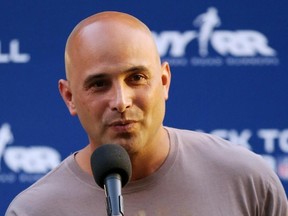 In this Aug. 30, 2012, file photo, Craig Carton talks during the NFL Back to Football Run at Central Park in New York. (John Minchillo/AP Images for NFL, File)