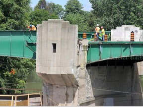 Some downtown Chatham businesses are noticing a marked decline in their activity since reconstruction of the Fifth Street Bridge started in early July. This file photo shows the work as it progressed toward the end of July.
