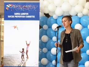 Holly Painter reads a poem as part of World Suicide Prevention Day at Lambton Mall in 2016. This year's event, Sunday, organized locally by the Sarnia Lambton Suicide Prevention Committee, is urging people to take time and engage with people who might be hurting. (Handout)