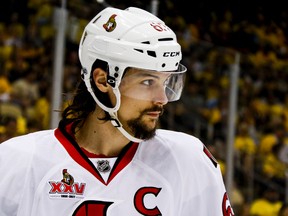 In this May 16, 2017, file photo, Ottawa Senators' Erik Karlsson prepares for a face-off during the second period of Game 2 of the Eastern Conference finals against the Pittsburgh Penguins, in Pittsburgh. (AP Photo/Gene J. Puskar, File)