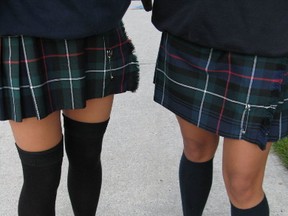 In an effort to make a handful of trans students feel more comfortable, a U.K. school has banned skirts such as the kilts seen here and now requires all students to wear grey pants. (Sun files)
