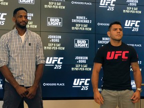 Mixed martial arts fighters Neil Magny (left) and Rafael dos Anjos (right) pose for photos at Rogers Place in Edmonton on Wednesday September 6, 2017. They will fight at Ultimate Fighting Championship (UFC) 215 in Edmonton on Saturday September 9, 2017.