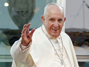 Pope Francis waves after speaking at the Nunciature in Bogota on Sept. 6, 2017. (AFP)