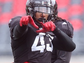 Ottawa Redblacks defensive end Jonathan Newsome gestures during practice on Wednesday. (TONY CAMPBELL/Ottawa Sun)