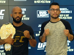 Mixed martial artists Demetrious Johnson (left) and Ray Borg (right) pose for photos at Rogers Place in Edmonton on September 6, 2017. They will fight at Ultimate Fighting Championship (UFC) 215 in Edmonton on Saturday September 9, 2017.