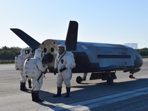 In this image released by the US Air Force, the Air Force's X-37B Orbital Test Vehicle mission 4 lands at NASA 's Kennedy Space Center Shuttle Landing Facility in Florida, on May 7, 2017. (Handout/US Air Force)