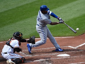 Toronto Blue Jays' Teoscar Hernandez connects for a single against the Baltimore Orioles in the third inning on Sept. 3, 2017. (AP Photo/Gail Burton)