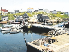 The harbour at Peggy?s Cove, N.S., is not only picturesque, but like the rest of the Maritime provinces, is praised as a downright friendly destination. (JIM FOX, Special to Postmedia News)