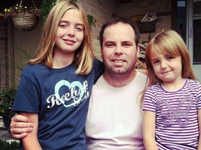 Supplied Photo
John Moulton with his daughters, Danica, left, and Olivia, are seen in a photo provided by family. Moulton, who died in a multi-vehicle highway crash, was ‘definition of family.'