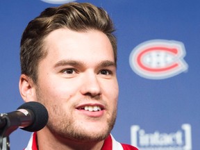 Newly acquired Montreal Canadien Jonathan Drouin answers a question as he is introduced to the media during a press conference at the Bell Centre, in Montreal on June 15, 2017. (THE CANADIAN PRESS/Ryan Remiorz)