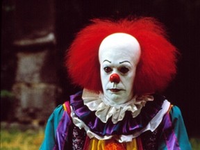 Tim Curry stars in a two-part TV movie adaptation of Stephen King’s "It."