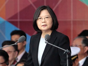 In this Oct. 10, 2016, file photo, Taiwan's President Tsai Ing-wen delivers a speech during National Day celebrations in front of the Presidential Building in Taipei, Taiwan. President-elect Donald Trump spoke Dec. 2, with the president of Taiwan, a self-governing island the U.S. broke diplomatic ties with in 1979. It is highly unusual, perhaps unprecedented, for a U.S. president or president-elect to speak directly with a Taiwanese leader and will be sure to anger China. Washington has pursued a so-called “one China” policy since 1979 when it shifted diplomatic recognition of China from the government in Taiwan to the communist government on the mainland. AP Photo/Chiang Ying-ying