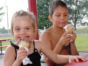 Lily Blundell (left) and her brother Bailey enjoy an ice cream at Shaw's Ice Cream south of St. Thomas in this file photo from 2012. Travel writer Bob Boughner says the ice cream shop is one of the area’s special delights, and has been in business for almost 70 years. (File photo)