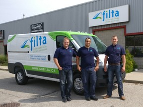 Co-owner Marius Kerkoff, lead technician Nick Klop and co-owner Daniel Overbeek (from left to right) stand in front of their mobile fryer management service. Filta Environmental Kitchen Solutions opened up its first Canadian franchisee in Woodstock last week. (Submitted)