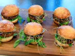 In this Aug. 14, 2017 file photo insect burgers are presented in Zurich, Switzerland. Swiss supermarket chain Coop, to a bit of hoopla, began selling “burgers” and “balls” made from insects. It’s billed as a first in Europe, a continent more accustomed to steak, sausage, poultry and fish as a source of protein rather than bugs that can be found in places like Africa or Asia. (Walter Bieri/Keystone via AP, file)