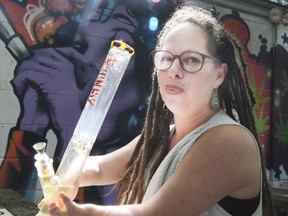 Abi Roach owner of the Hotbox Cafe in Kensington Market on Friday September 8, 2017. (Veronica Henri/Toronto Sun)