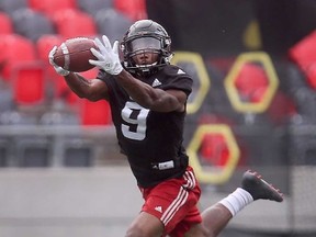 Redblacks’ Jonathan Rose hauls in a pass during practice at TD Place earlier this week. (Tony Caldwell/Ottawa Sun)