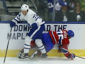 Kristian Pospisll of the Toronto Maple Leafs runs into Maxime Fortier of the Montreal Canadiens during the rookie tournament at the Ricoh Coliseum in Toronto on Friday, September 8, 2017. (Dave Abel/Toronto Sun/Postmedia Network)