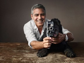 George Clooney is seen with his dog, Einstein in an advertisement for Omega watches. (Omega/Supplied)