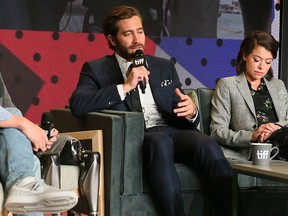 (L to R) Jeff Bauman, Jake Gyllenhaal and Tatiana Maslany during the press conference for the movie "Stronger" at the Toronto International Film Festival in Toronto on Saturday, Sept. 9, 2017. (Veronica Henri/Postmedia Network)