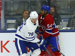 Eemeli Rasanen of the Toronto Maple Leafs rookies evades Jeremiah Addison of the Montreal Canadiens rookies at Ricoh Coliseum in Toronto on Friday, Sept. 8, 2017. (Dave Abel/Toronto Sun)