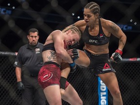 Amanda Nunes won a split decision after five rounds over Valentina Shevchenko in the Women's Bantamweight Title bout at UFC 215 at Rogers Place in Edmonton on September 9, 2017.