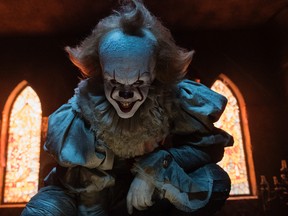 This image released by Warner Bros. Pictures shows Bill Skarsgard in a scene from "It." (Brooke Palmer/Warner Bros. Pictures via AP)