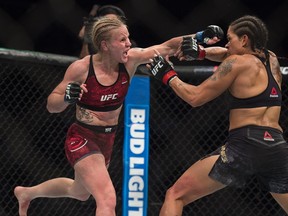 Amanda Nunes won a split decision after five rounds over Valentina Shevchenko in the Women's Bantamweight Title bout at UFC 215 at Rogers Place in Edmonton on September 9, 2017.  Photo by Shaughn Butts / Postmedia