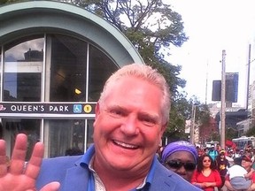 Toronto mayoral candidate Doug Ford is pictured marching in Saturday's Jesus in the City Parade. (SUPPLIED PHOTO)