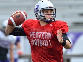 Western Mustang quarterback Chris Merchant (MORRIS LAMONT, The London Free Press)