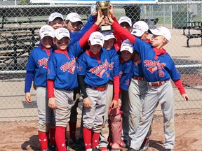 The Mitchell Mosquito Astros baseball team went undefeated to win the Ontario Baseball Association (OBA) ‘D’ championship in Chatham Sept. 3.  Team members assist each other in raising the trophy in celebration, with many of the boys repeating as OBA champs after a successful run last year. A run through town celebrating the victory was held this past Sunday night, Sept. 10. SUBMITTED