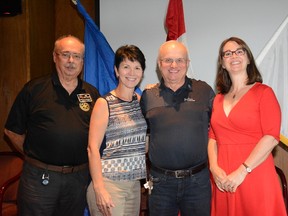 From the left, local Rotary district assistant governor Ed Holtner, Rotary Foundation chair Nevis Prufer, charter member Arnie Olexan and acting president Holly Astill pose together during the Whitecourt Rotary Club meeting at Ritz Cafe and Motor Inn on Sept.  7 (Peter Shokeir | Whitecourt Star).