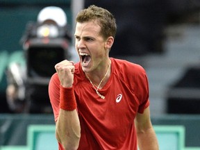 Canada's Vasek Pospisil reacts after a point against Great Britain's Daniel Evans during Davis Cup World Group tie tennis action, Sunday, Feb. 5, 2017 in Ottawa.