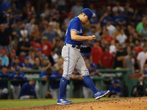 Toronto Blue Jays relief pitcher Roberto Osuna kicks the dirt after giving up a run to the Boston Red Sox during an MLB game at Fenway Park in Boston on Sept. 5, 2017. (AP Photo/Winslow Townson)