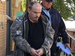 Normand Lavoie leaves Court of Queens Bench in Melfort, Sask., Monday, Sept.11, 2017. Lavoie was sentenced to three years in prison for killing three teenage boys when his semi hit their car in a construction zone in May 2015.THE CANADIAN PRESS/Jennifer Graham