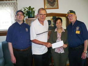 Grand knight David Cook, left, of Knights of Columbus Father Brian McKee Council 1387, Steve Yawney, golf tournament organizer, Mary Ali, executive director of Inner City Home of Sudbury, and Jim Cook, of Knights of Columbus, Council 1387, take part in the cheque presentation. Supplied photo