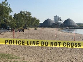 Durham Regional Police at the scene on a beach near the Oshawa Harbour after a fisherman found a woman's torso floating in Lake Ontario on Monday, Sept. 11, 2017. (Chris Doucette/Toronto Sun)