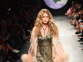 Gigi Hadid walks the runway for Anna Sui fashion show during New York Fashion Week: The Shows at Gallery 1, Skylight Clarkson Sq on September 11, 2017 in New York City. (Photo by Frazer Harrison/Getty Images For NYFW: The Shows)